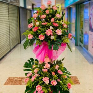 Sweet Pink Opening Flowers Stand